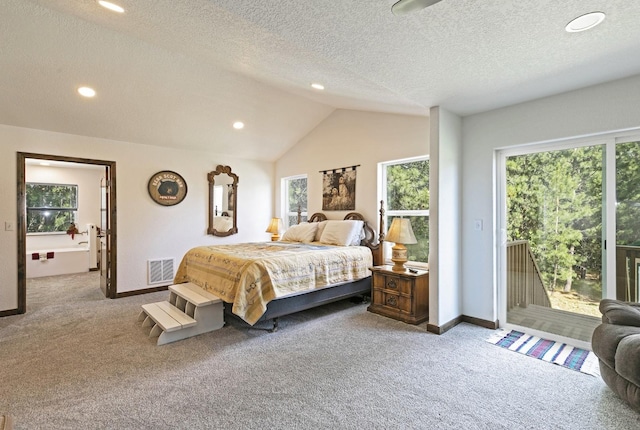 3979 Evenson Ln, Stevensville, MT 59870 - bedroom featuring carpet, access to outside, lofted ceiling, recessed lighting, and a textured ceiling