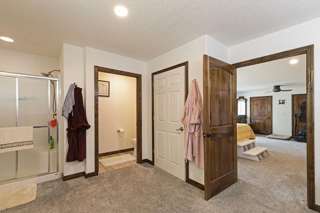 3979 Evenson Ln, Stevensville, MT 59870 - corridor with carpet flooring, recessed lighting, and a textured ceiling