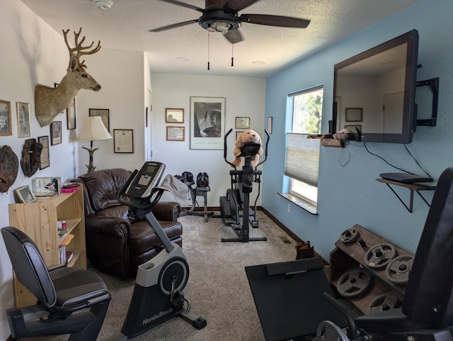 3979 Evenson Ln, Stevensville, MT 59870 - exercise room featuring a ceiling fan, carpet, and a textured ceiling