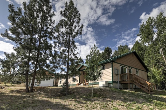 3979 Evenson Ln, Stevensville, MT 59870 - view of side of home with a cooling unit
