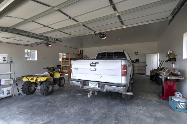 3979 Evenson Ln, Stevensville, MT 59870 - garage featuring a garage door opener