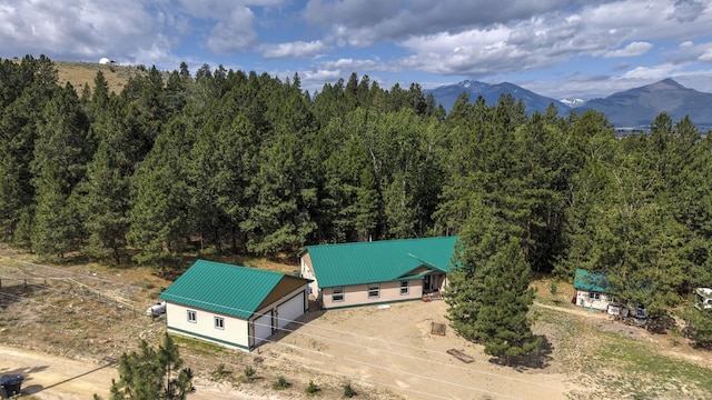 3979 Evenson Ln, Stevensville, MT 59870 - view from above of property with a mountainous background and a heavily wooded area