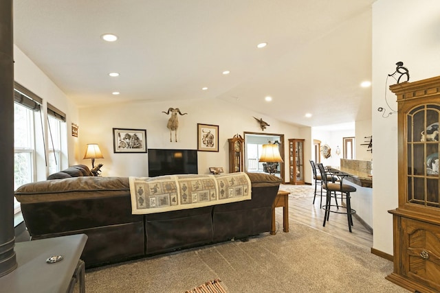 3979 Evenson Ln, Stevensville, MT 59870 - living area with vaulted ceiling, recessed lighting, and wood finished floors