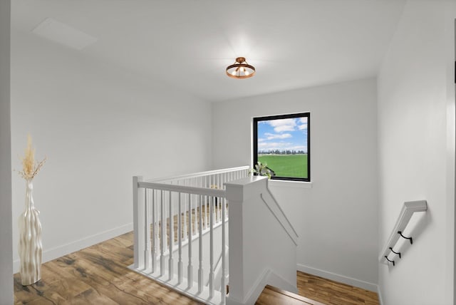 1244 S Wintercrest Dr, Kalispell, MT 59901 - staircase featuring wood finished floors and baseboards