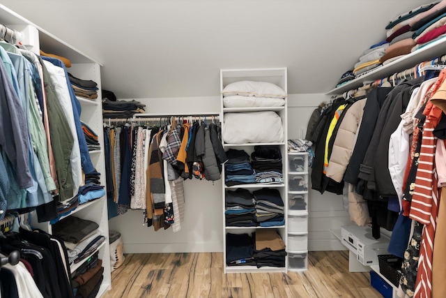 1244 S Wintercrest Dr, Kalispell, MT 59901 - walk in closet featuring wood finished floors