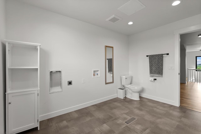 1244 S Wintercrest Dr, Kalispell, MT 59901 - washroom featuring hookup for an electric dryer, washer hookup, recessed lighting, and dark wood-style flooring