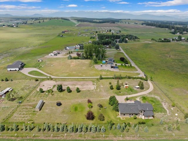 1244 S Wintercrest Dr, Kalispell, MT 59901 - aerial view of property's location with rural landscape and a mountain backdrop