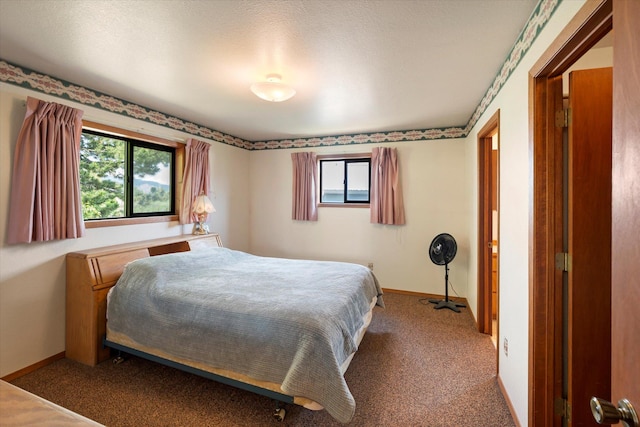 3250 US Highway 2 W, Kalispell, MT 59901 - carpeted bedroom with baseboards