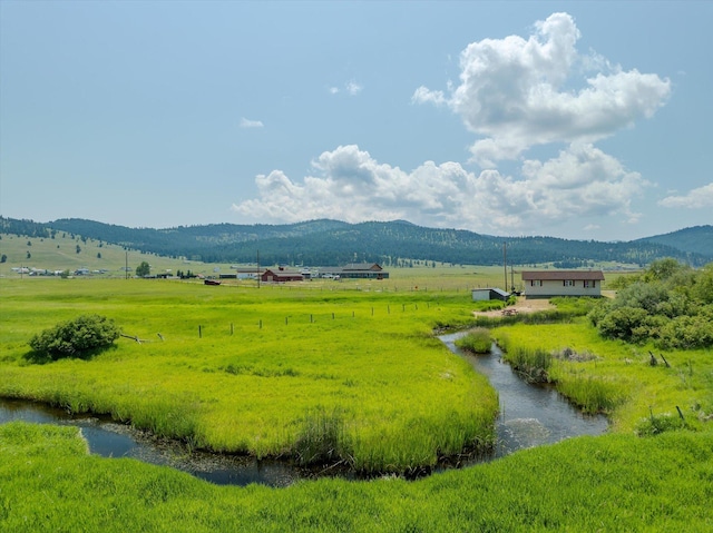 3250 US Highway 2 W, Kalispell, MT 59901 - mountain view with rural landscape and a pastoral area