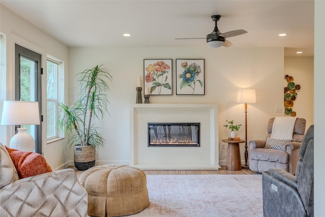 405 Kendal Loop, Kalispell, MT 59901 - living area with recessed lighting, a ceiling fan, wood finished floors, and a glass covered fireplace