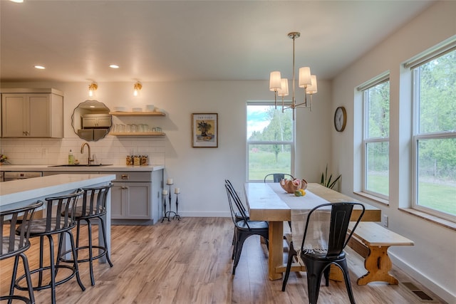 405 Kendal Loop, Kalispell, MT 59901 - dining space featuring light wood-type flooring, a chandelier, and recessed lighting