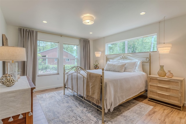 405 Kendal Loop, Kalispell, MT 59901 - bedroom with wood finished floors and recessed lighting