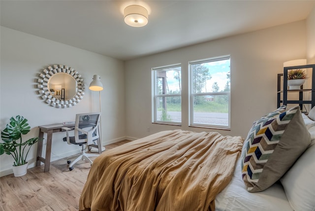 405 Kendal Loop, Kalispell, MT 59901 - bedroom with light wood finished floors and baseboards