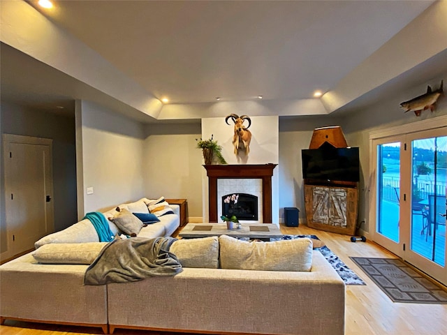 37 Roybals Way, Kalispell, MT 59901 - living area featuring light wood-type flooring, recessed lighting, and a tile fireplace