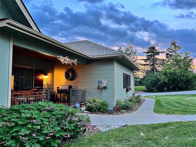 37 Roybals Way, Kalispell, MT 59901 - view of side of property with a yard and a shingled roof