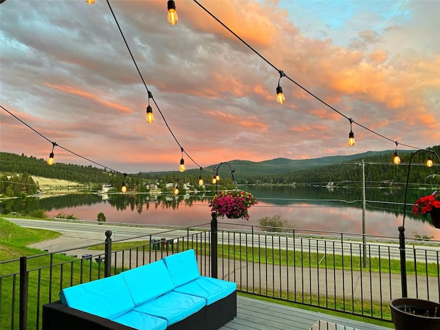 37 Roybals Way, Kalispell, MT 59901 - wooden terrace with a water view