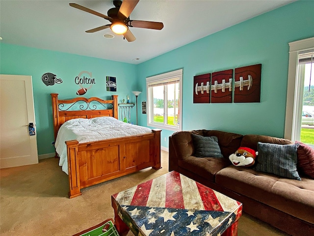 37 Roybals Way, Kalispell, MT 59901 - bedroom featuring light carpet, multiple windows, and ceiling fan