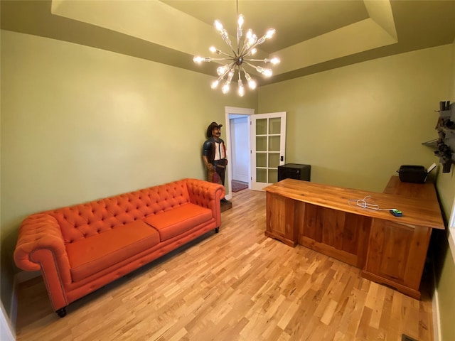 37 Roybals Way, Kalispell, MT 59901 - office area with a chandelier, light wood-type flooring, and a raised ceiling
