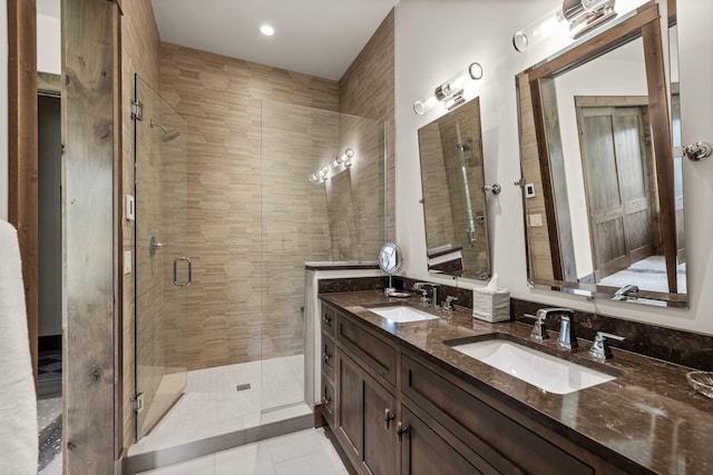 176 Whitefish Hills Loop, Whitefish, MT 59937 - full bathroom with a stall shower, double vanity, tile patterned flooring, and recessed lighting