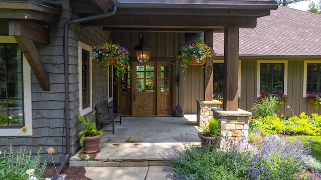 176 Whitefish Hills Loop, Whitefish, MT 59937 - property entrance featuring board and batten siding and roof with shingles