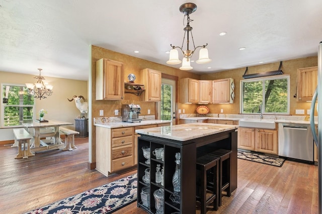 745 Capistrano Dr, Kalispell, MT 59901 - kitchen featuring a chandelier, dishwasher, light brown cabinetry, plenty of natural light, and recessed lighting