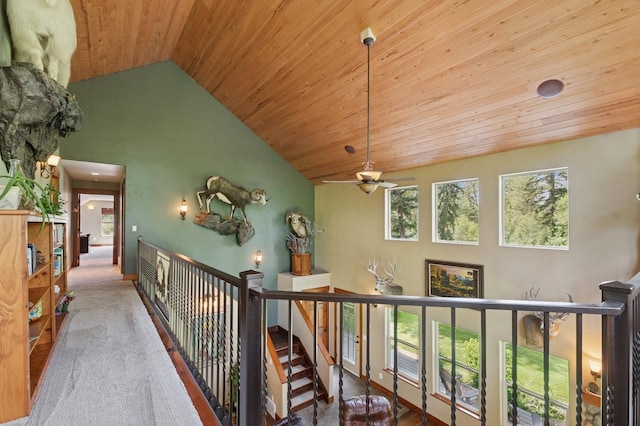 745 Capistrano Dr, Kalispell, MT 59901 - corridor featuring wood ceiling, high vaulted ceiling, and carpet flooring
