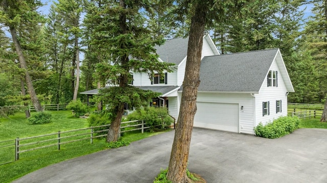 745 Capistrano Dr, Kalispell, MT 59901 - view of front of property featuring driveway and roof with shingles