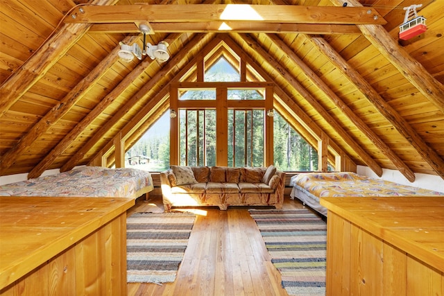 235 Red Meadow Rd, Polebridge, MT 59928 - unfurnished living room with wooden ceiling, plenty of natural light, and hardwood / wood-style floors