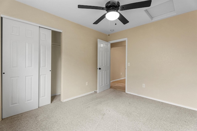 4012 Lancaster Rd, Missoula, MT 59808 - unfurnished bedroom with light colored carpet, attic access, a closet, and ceiling fan