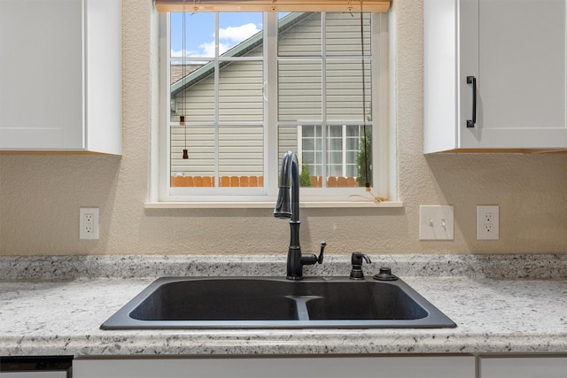 4012 Lancaster Rd, Missoula, MT 59808 - kitchen view of white cabinetry and a textured wall