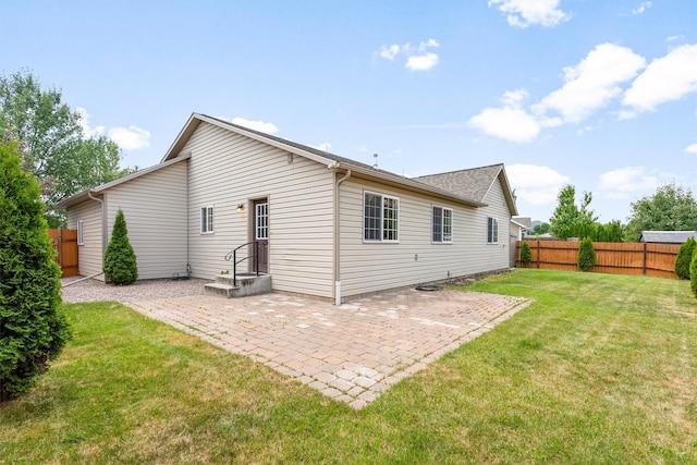 4012 Lancaster Rd, Missoula, MT 59808 - rear view of house with a patio and a fenced backyard