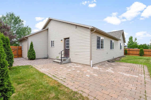4012 Lancaster Rd, Missoula, MT 59808 - rear view of house featuring a patio area and a fenced backyard