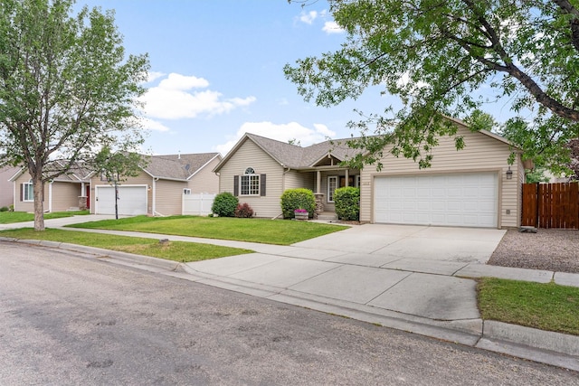 4012 Lancaster Rd, Missoula, MT 59808 - ranch-style home with a garage and concrete driveway