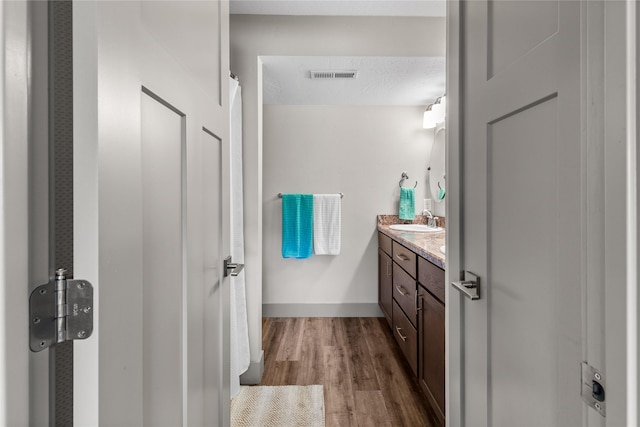 6910 Shaver Dr, Missoula, MT 59803 - bathroom featuring vanity and wood finished floors