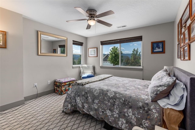 6910 Shaver Dr, Missoula, MT 59803 - bedroom with carpet flooring and a ceiling fan