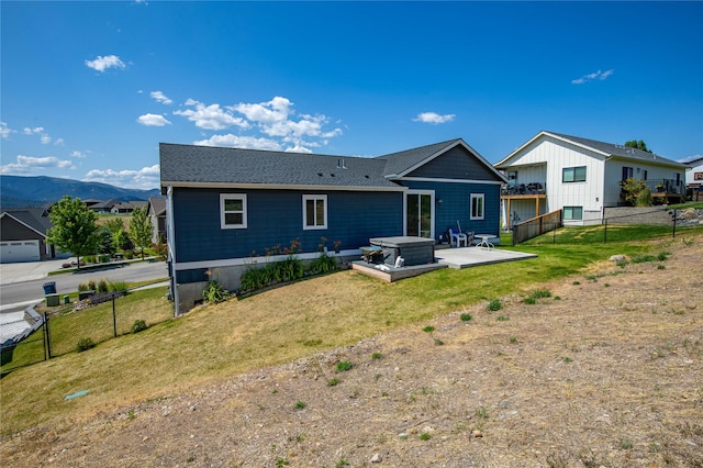 6910 Shaver Dr, Missoula, MT 59803 - back of house with a fenced backyard and a wooden deck