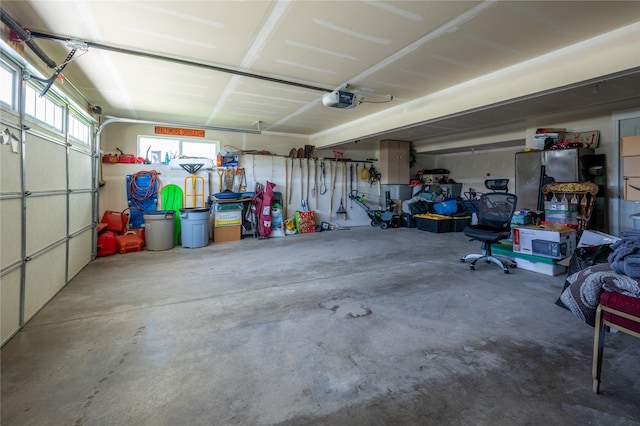 6910 Shaver Dr, Missoula, MT 59803 - garage featuring a garage door opener