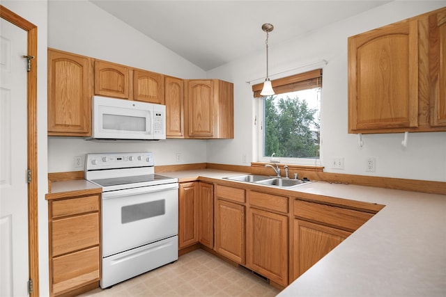 3477 Birkland Dr, Helena, MT 59602 - kitchen with white appliances, vaulted ceiling, light countertops, and decorative light fixtures