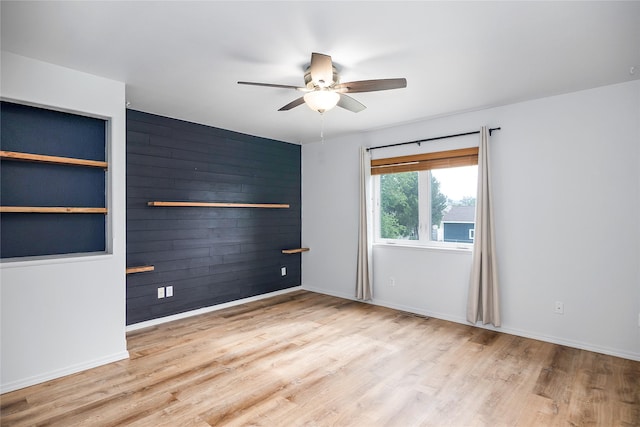 3477 Birkland Dr, Helena, MT 59602 - spare room with wood finished floors and ceiling fan