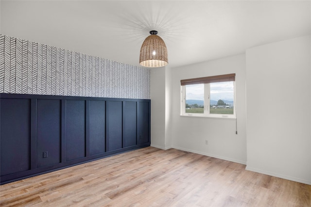 3477 Birkland Dr, Helena, MT 59602 - empty room featuring light wood-style flooring and baseboards