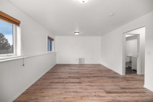 3477 Birkland Dr, Helena, MT 59602 - spare room featuring wood finished floors and a smoke detector