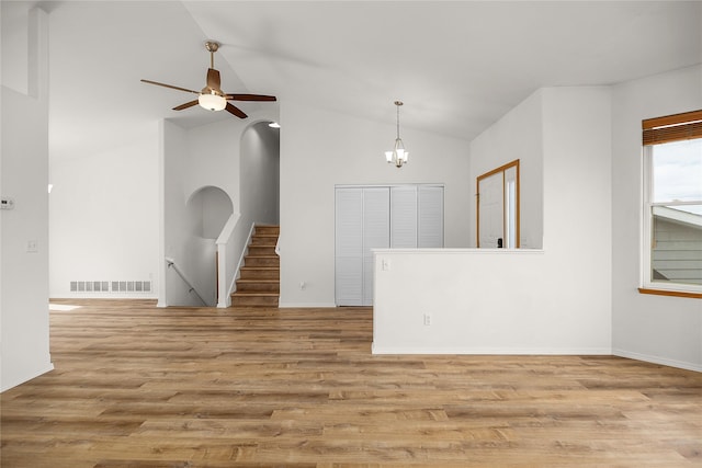 3477 Birkland Dr, Helena, MT 59602 - empty room with lofted ceiling, wood finished floors, and ceiling fan
