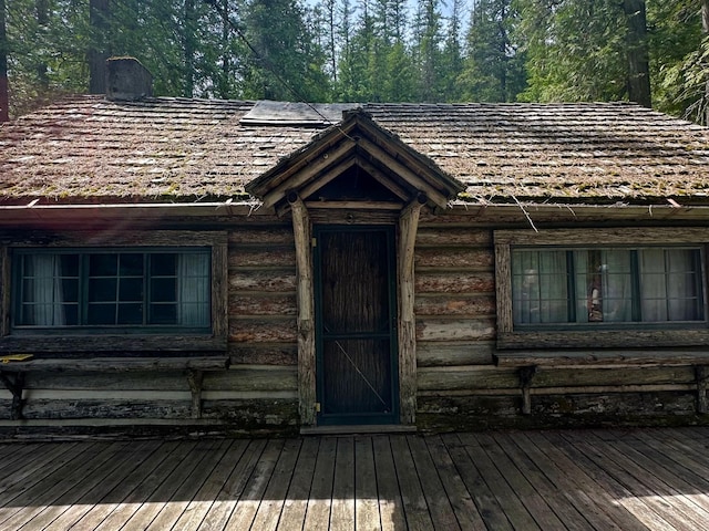489 Grist Rd, West Glacier, MT 59936 - property entrance featuring a wooden deck