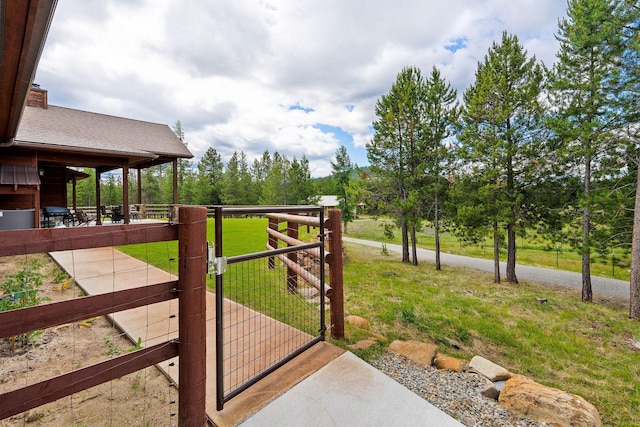 71 Cw Mitchell Ct, Marion, MT 59925 - wooden terrace featuring a gate and an exterior structure