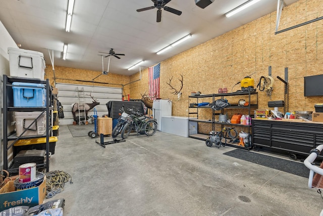71 Cw Mitchell Ct, Marion, MT 59925 - garage with a ceiling fan and a workshop area