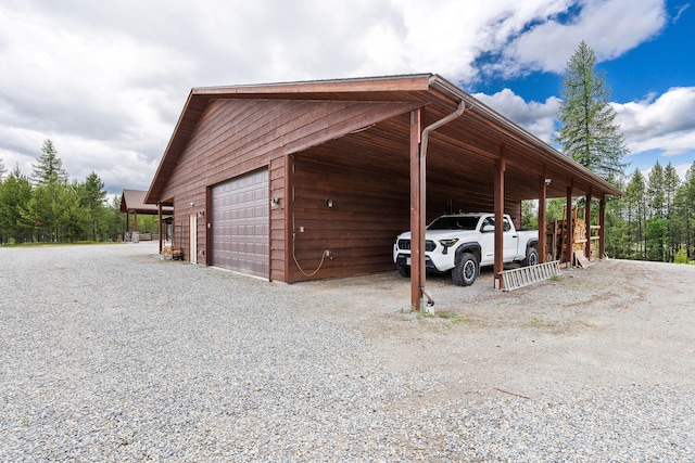 71 Cw Mitchell Ct, Marion, MT 59925 - garage featuring a detached garage and driveway