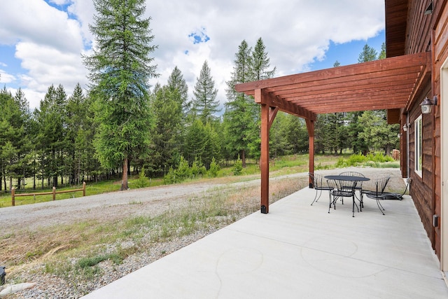 71 Cw Mitchell Ct, Marion, MT 59925 - view of patio featuring a pergola and outdoor dining space