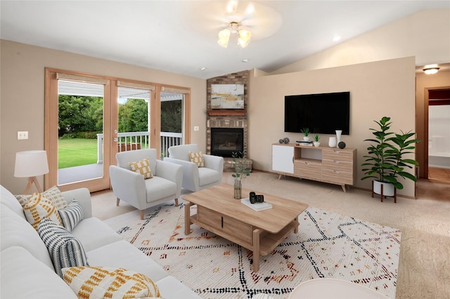 133 Trailridge Rd, Kalispell, MT 59901 - living area featuring lofted ceiling, carpet flooring, and a fireplace