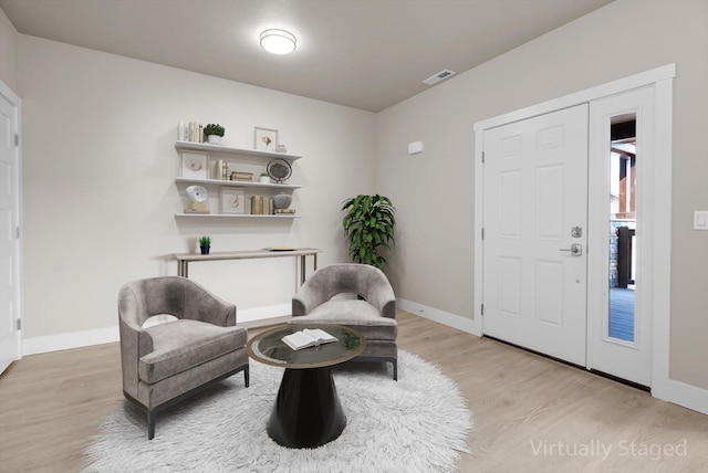 6201 Shiloh Ave Unit G, Whitefish, MT 59937 - living area featuring light wood-style flooring and baseboards