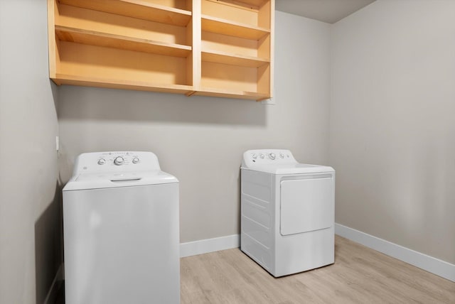 6201 Shiloh Ave Unit G, Whitefish, MT 59937 - laundry room with separate washer and dryer and light wood-type flooring